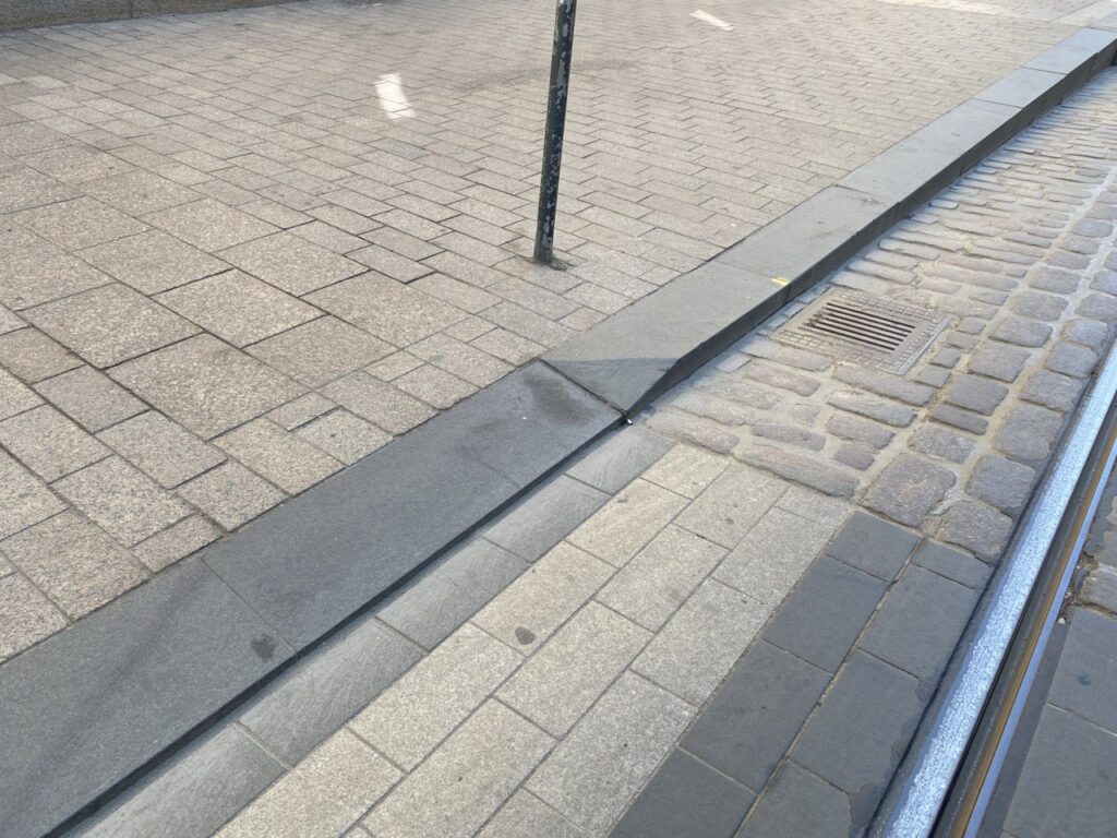 a cut in the kerb to enable those unable to step up the kern to access the pavement.