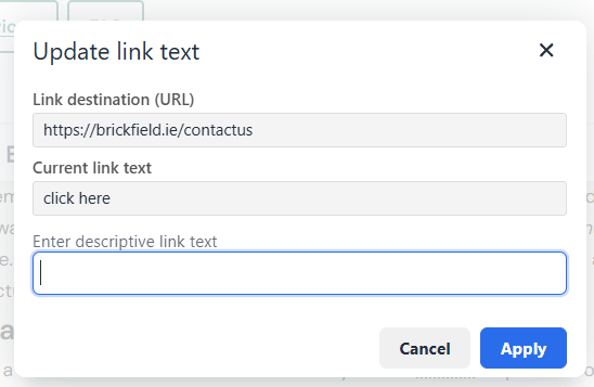 The link editor prompting the author to replace click here with descriptive link text